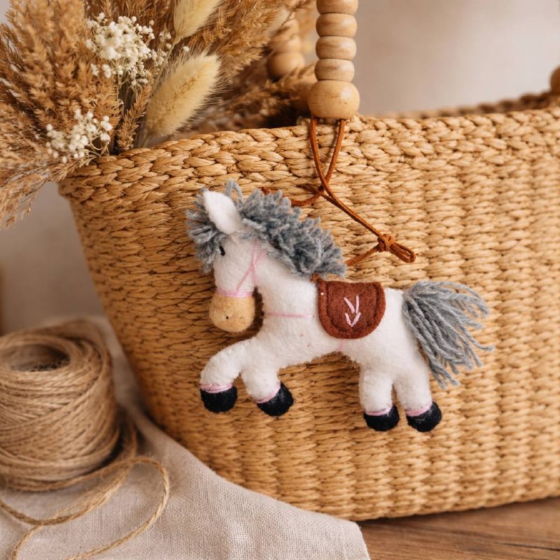 White Pony charm — woven basket (lifestyle)